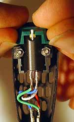 A cartridge mounted in it's head shell and cartridge wiring attached.